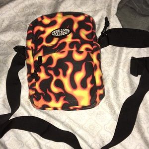 A zumiez petals and peacock fire pouch